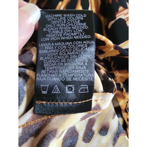 Norma Kamali boat neck sleeveless fitted cheetah print midi dress, size large - Picture 5 of 5